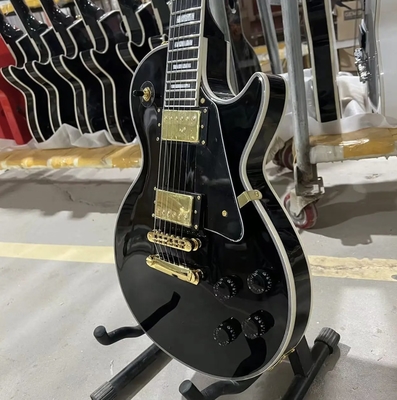 China. Disco personalizado de estilo GB Les Paul Guitarra eléctrica, cuerpo de caoba, tablero de fret de ébano, color negro, hardware dorado, unión de fret proveedor