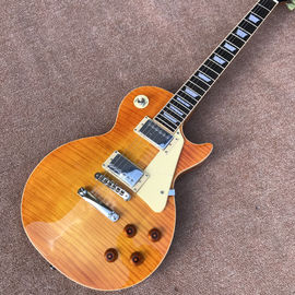 China. Una pieza del cuerpo y el cuello de la guitarra eléctrica LP Yellow tiger top ajustando el puente Matic adyacente proveedor