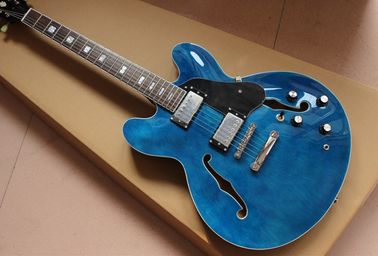 China. Guitarra eléctrica de alta calidad en cuerpo hueco de color azul con hardware cromado proveedor