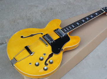 China. Guitarra eléctrica de cuerpo semi hueco amarillo personalizado con chapa de arce de fuego, tablero de fretwood de madera de rosa proveedor