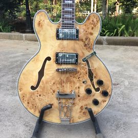 China. Guitarras eléctricas de jazz en natural proveedor