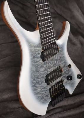 China. 2025 Frets ventilados 7 cuerdas Guitarra eléctrica sin cabeza Color blanco con eye Poplar 5 capas Arce asado proveedor