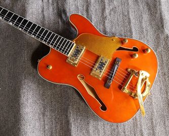 China. Custom naranja TL cuerpo hueco f agujero ébano tablero de dedos oro puente guitarra eléctrica tienda de instrumentos musicales proveedor