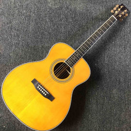 China. Guitarra eléctrica acústica personalizada OM cuerpo redondo cuerpo sólido guitarra de madera de rosa tablero de dedos de caoba lado trasero con EQ proveedor
