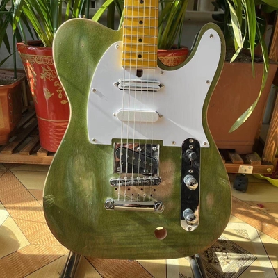 China. Guitarra eléctrica de relic en color verde proveedor