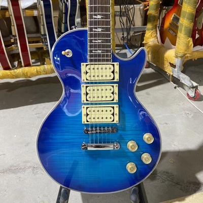 China. Estilo LP personalizado Ace Frehley Hummbucker Pickups Guitarra eléctrica con Fingerboard de madera de rosa Cuerpo de caoba Color azul Aceptar proveedor