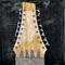 17 cuerdas personalizadas Cuello a través del cuerpo Guitarra de bajo eléctrico con incrustación sin fretes Fingerboard Rosewood proveedor