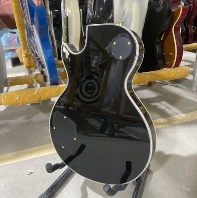 Disco personalizado de estilo GB Les Paul Guitarra eléctrica, cuerpo de caoba, tablero de fret de ébano, color negro, hardware dorado, unión de fret proveedor