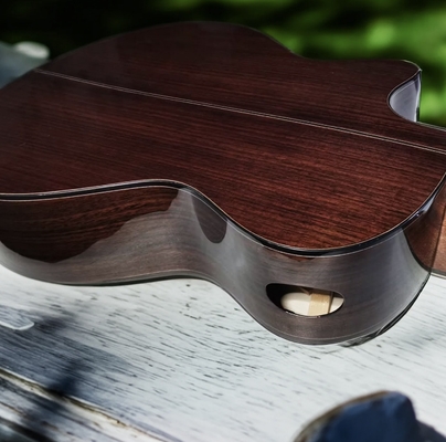 Guitarra acústica de madera sólida: obra maestra de madera sólida con estilo vintage proveedor