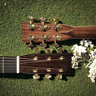 Guitarra acústica de madera sólida: obra maestra de madera sólida con estilo vintage proveedor