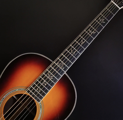 Guitarra hecha a mano con cola de paloma Guitarra acústica sólida KOA proveedor