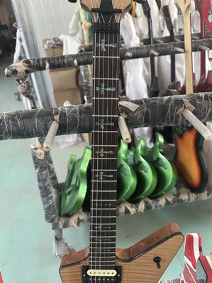 Guitarra eléctrica de madera de rosa de forma irregular proveedor