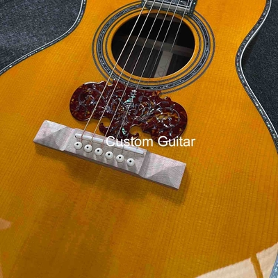 6 cuerdas personalizadas OEM de madera maciza guitarra acústica OO de 38 pulgadas cuerpo de ébano puente proveedor