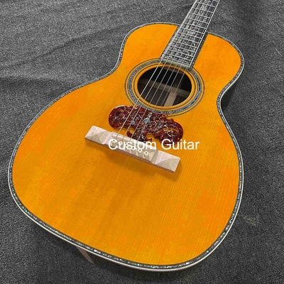 6 cuerdas personalizadas OEM de madera maciza guitarra acústica OO de 38 pulgadas cuerpo de ébano puente proveedor