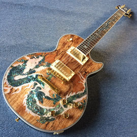 Nueva guitarra eléctrica LP de alta calidad, Abalone Dinosaur incrustada en el panel y el cuerpo de la guitarra eléctrica LP, gratis. proveedor