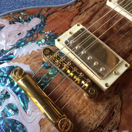 Nueva guitarra eléctrica LP de alta calidad, Abalone Dinosaur incrustada en el panel y el cuerpo de la guitarra eléctrica LP, gratis. proveedor
