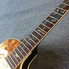 Nueva guitarra eléctrica LP de alta calidad, Abalone Dinosaur incrustada en el panel y el cuerpo de la guitarra eléctrica LP, gratis. proveedor