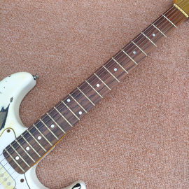 Nuevo estilo de alta calidad de reliquia permanece ST guitarra eléctrica, artesanal ST de edad reliquia guitarra eléctrica proveedor