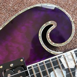 Guitarra eléctrica púrpura de diseño nuevo, con cáscara de mujer hermosa en el cuerpo, guitarras de 6 cuerdas, guitarra de alta calidad proveedor