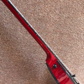 Guitarra eléctrica nueva a medida Color rojo de venta caliente Guitarra eléctrica de 6 cuerdas Guitarras con unión negra y hardware negro proveedor