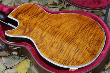Dispositivo doble Tiger Flame Maple superior LP supremo Guitarra eléctrica hardware dorado proveedor