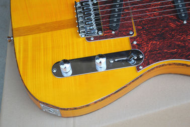 Guitarra eléctrica de cuerpo amarillo al por mayor personalizada con protector de tortuga roja, tablero fret amarillo de arce proveedor