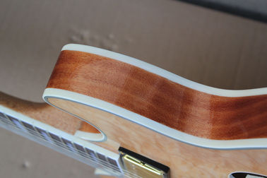 Guitarra eléctrica de madera, cuerpo de arce, hardware de oro. proveedor