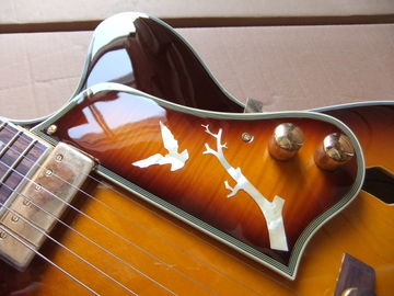 Nueva guitarra eléctrica de jazz modelo L-5 con protector de flores y taco y cabeza en Sunburst proveedor