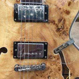 Guitarras eléctricas de jazz en natural proveedor