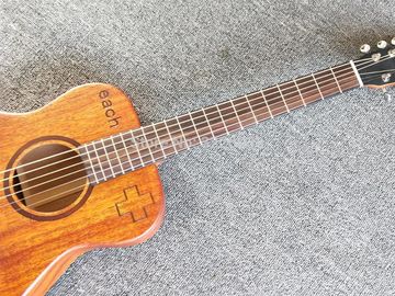 Guitarra acústica de viaje de 34 pulgadas, de madera de fábrica Sapele, de arriba y atrás, Mini Guitarra acústica proveedor