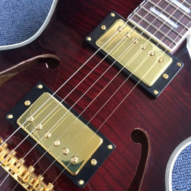 Guitarra eléctrica de nuevo estilo de alta calidad, agujeros de doble F, tablero de madera de rosa proveedor