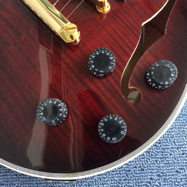 Guitarra eléctrica de nuevo estilo de alta calidad, agujeros de doble F, tablero de madera de rosa proveedor