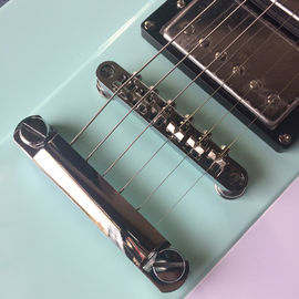 Guitarra eléctrica personalizada de alta calidad, tablero de madera de rosa, guitarra eléctrica verde claro proveedor