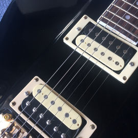 Guitarra eléctrica personalizada de alta calidad, tablero de madera de rosa, guitarra eléctrica negra, sistema Tremolo proveedor