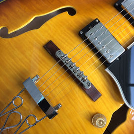 Guitarra eléctrica de jazz de cuerpo hueco, guitarra eléctrica de color chocolate con sistema Tremolo, Ebony Fingerboard proveedor