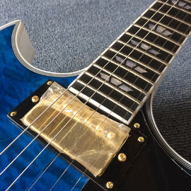 Guitarra eléctrica de jazz de alta calidad con Bigsby, tablero de ébano, guitarra con colchas de color Trans-azul proveedor