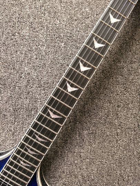 Tienda personalizada blueburst Flying V Guitarra eléctrica Flying v Guitarra China Guitarra OEM proveedor
