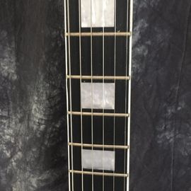 China Flying V Guitar. guitarra eléctrica. buena calidad de sonido Flying V guitarra eléctrica color natural proveedor
