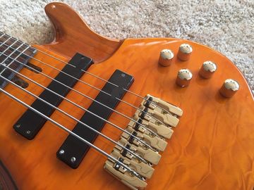 Guitarra baja de 6 cuerdas JP2 cuerpo de arce acolchado amarillo atrás y delante Recogidas activas Puentes dorados y sintonizador Alder con ebo proveedor