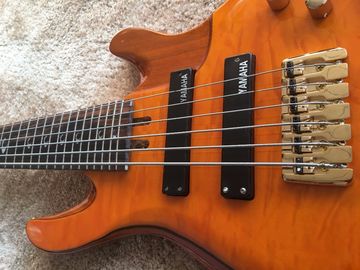 Guitarra baja de 6 cuerdas JP2 cuerpo de arce acolchado amarillo atrás y delante Recogidas activas Puentes dorados y sintonizador Alder con ebo proveedor