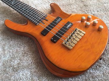 Guitarra baja de 6 cuerdas JP2 cuerpo de arce acolchado amarillo atrás y delante Recogidas activas Puentes dorados y sintonizador Alder con ebo proveedor