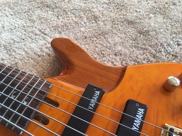 Guitarra baja de 6 cuerdas JP2 cuerpo de arce acolchado amarillo atrás y delante Recogidas activas Puentes dorados y sintonizador Alder con ebo proveedor