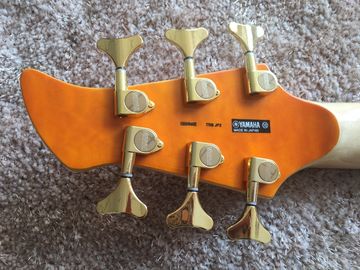 Guitarra baja de 6 cuerdas JP2 cuerpo de arce acolchado amarillo atrás y delante Recogidas activas Puentes dorados y sintonizador Alder con ebo proveedor