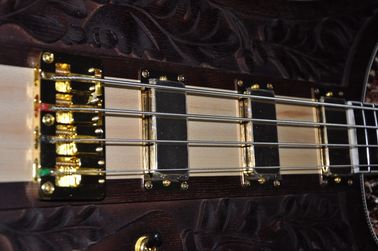 Guitarra de bajo personalizada Cuerpo de flores talladas Cuello a través del cuerpo 4 cuerdas guitarra de bajo eléctrica 4003 RIC Hardwares de oro proveedor