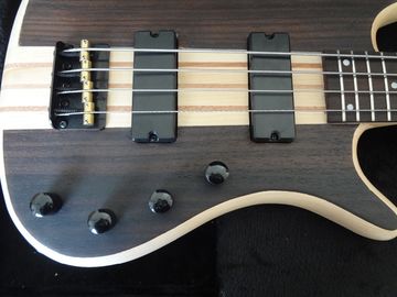 4 cuerdas de bajo de la guitarra de madera de nuez con cuerpo de ceniza Puentes originales Cuello a través del cuerpo incrustación de puntos MOP en fretboar de madera de rosa proveedor
