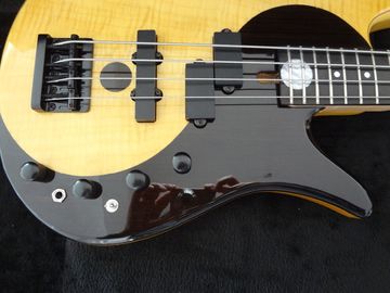 4 cuerdas de bajo Fodera bajo personalizado Alder con el cuerpo de diseño Taiji logotipo de incrustación MOP proveedor