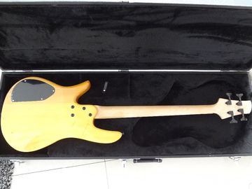 4 cuerdas de bajo Fodera bajo personalizado Alder con el cuerpo de diseño Taiji logotipo de incrustación MOP proveedor