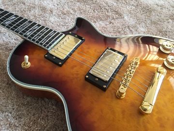 LP guitarra personalizada tabaco solar estallido cuerpo de arce acolchado contorno de espalda y contorno de la articulación del cuello guitarra personalizada tablero de ébano proveedor