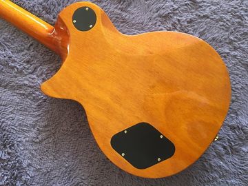 LP guitarra personalizada tabaco solar estallido cuerpo de arce acolchado contorno de espalda y contorno de la articulación del cuello guitarra personalizada tablero de ébano proveedor