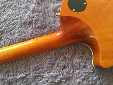 LP guitarra personalizada tabaco solar estallido cuerpo de arce acolchado contorno de espalda y contorno de la articulación del cuello guitarra personalizada tablero de ébano proveedor
